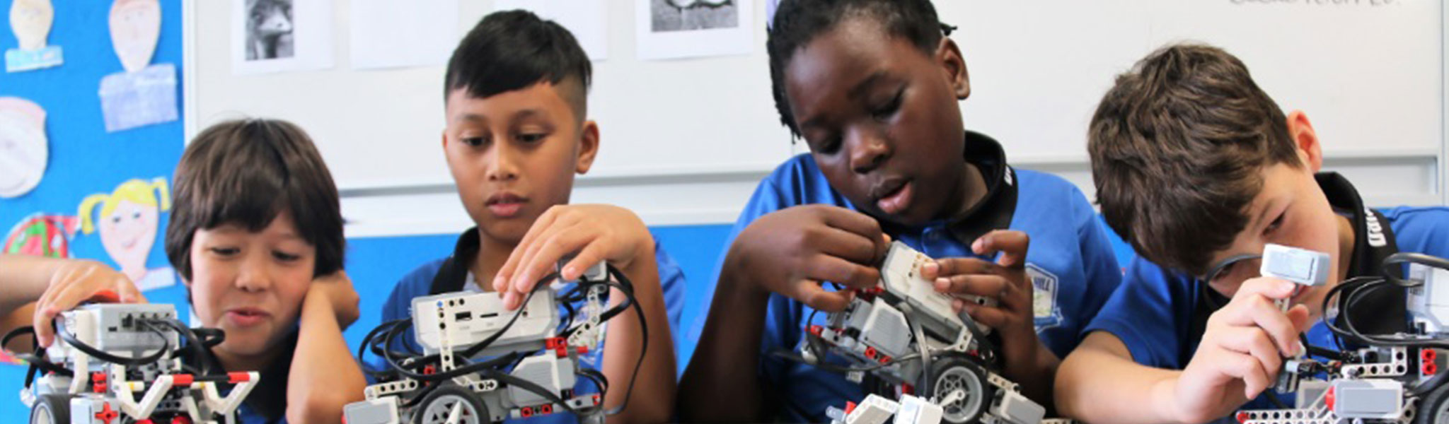 Students looking at Lego figurines